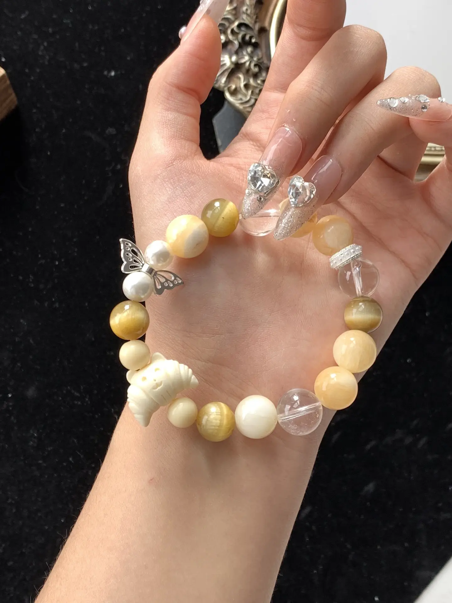 i1730638984_5515_3.webp Ivory Fruit Golden Tiger Eye Calcite White Crystal 10-12mm - Image 1