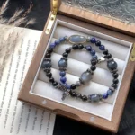 Blue patterned stone, silver glitter, obsidian, lime, moonlight backbone