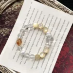 White crystal, yellow tower crystal, gold lithium mica 9-12