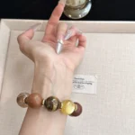 Gold lithium mica yellow tiger eye lightning strike wood yellow glue flower 17-18mm